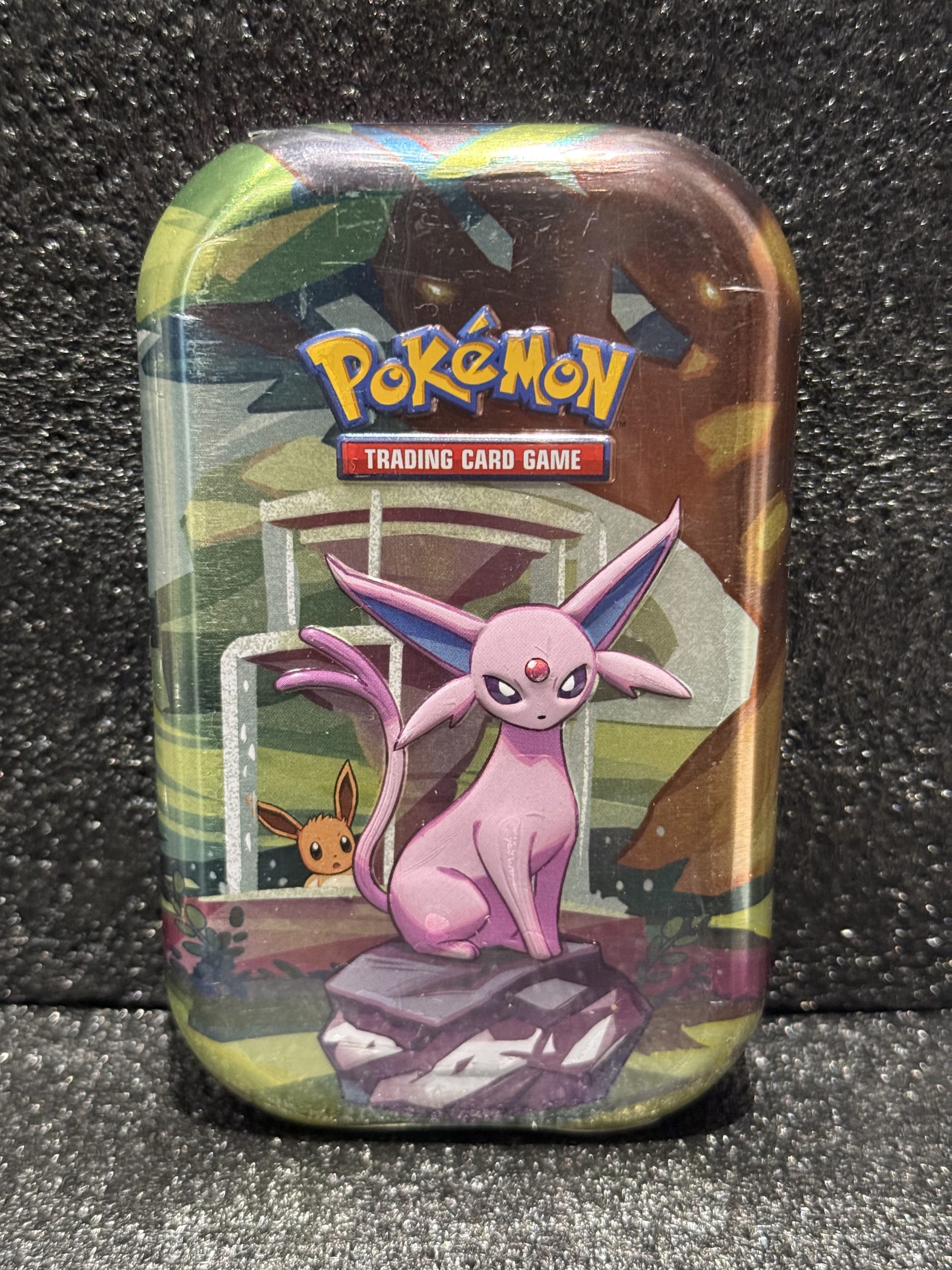 Pokemon – MINI TIN ÉVOLUTIONS PRISMATIQUE MENTALI (FR)