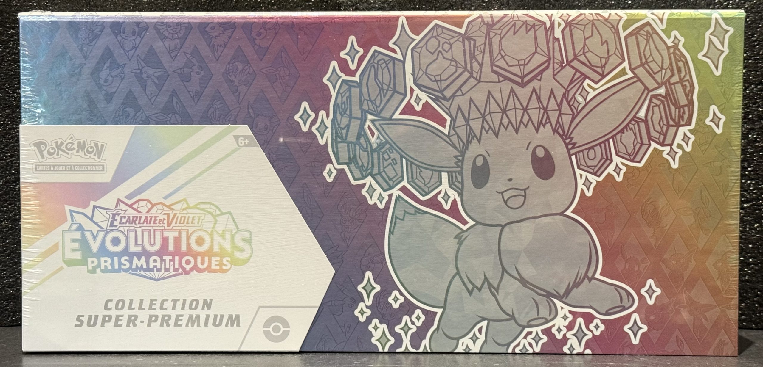 POKEMON – COFFRET COLLECTION SUPER-ULTRA PREMIUM E&V ÉVOLUTIONS PRISMATIQUES (FR)